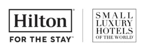 Hilton logo next to Small Luxury Hotels logo.